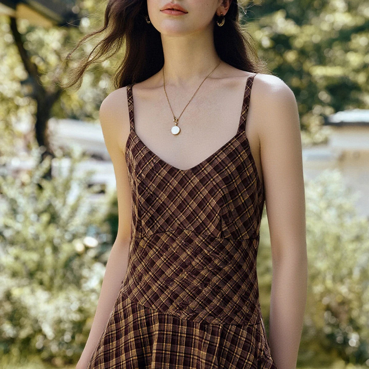 OLrain Oriel 2025 فستان نسائي شتوي جديد Maillard بألوان متباينة منقوش بدون أكمام فستان طويل راقي