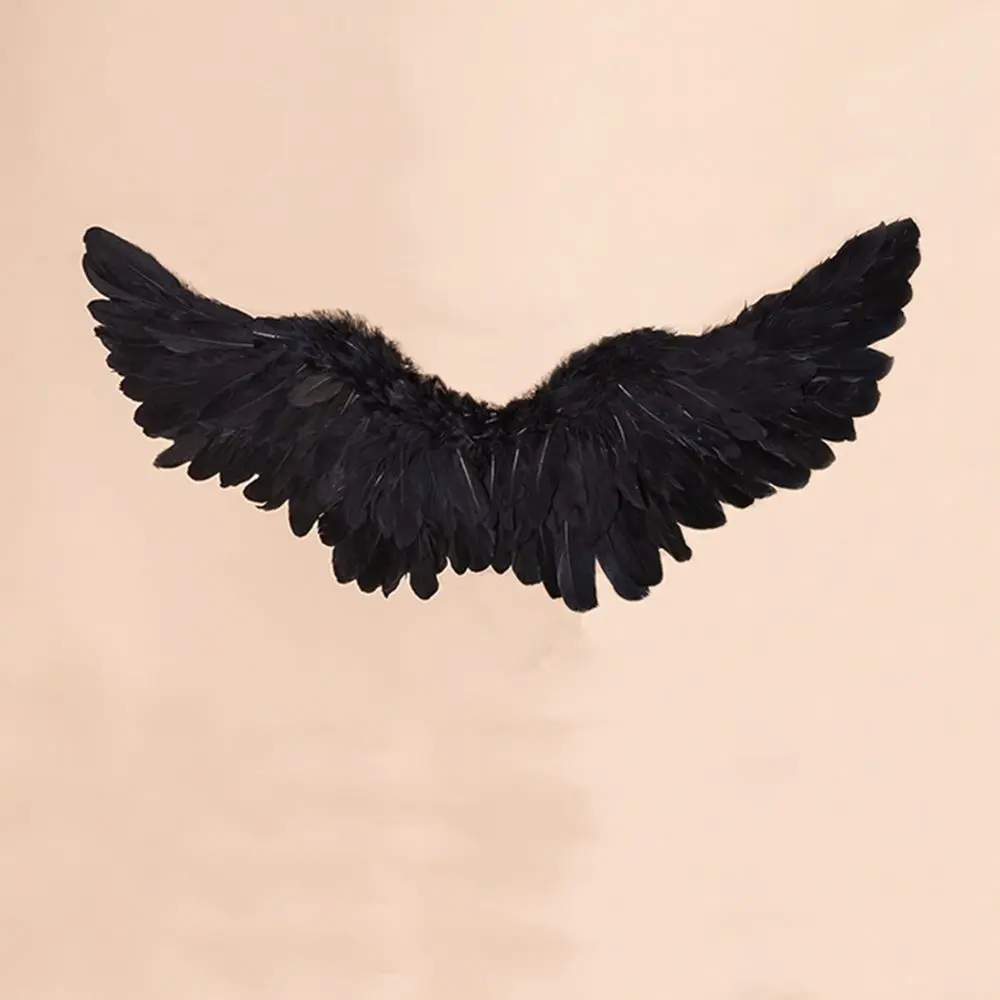 Ailes d'ange noires de 55 cm - Ailes en plumes - Costume d'ange pour femme avec auréole Ailes d'ange noires de 55 cm - Ailes en plumes - Costume d'ange pour femme avec auréole