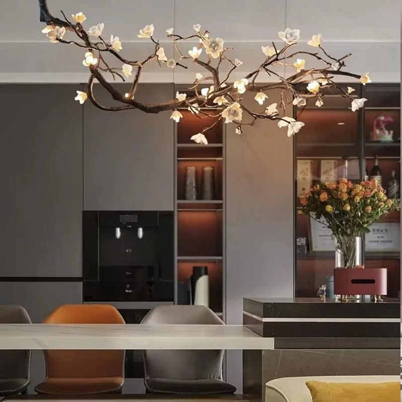 

Nordic-style ceramic and copper tree branch pendant lamp, suitable for living rooms and hotel restaurant lighting. Black body.