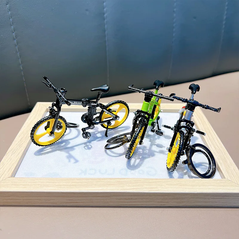 Portachiavi modello bici pieghevole Portachiavi in plastica Mini dito Pedale da montagna Borsa da bici Portachiavi pendente Giocattolo regalo per bambini Uomini Collezionista