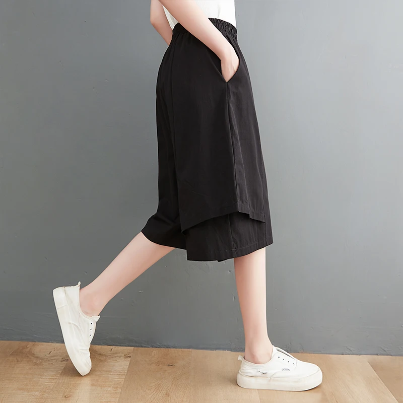 صيف جديد حجم كبير المرأة عادية واسعة الساق ort السراويل غير النظامية الربط فضفاضة تناسب خمسة أرباع طول التخسيس تنورة السراويل