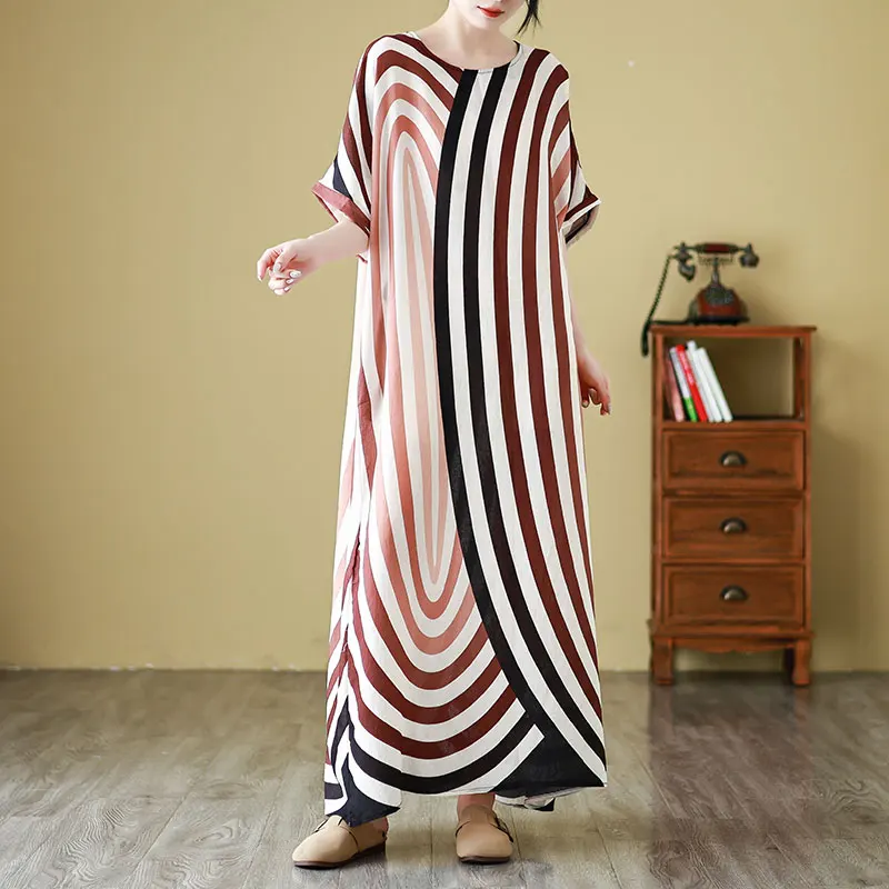 تنورة شاطئ طويلة فضفاضة للصيف والجولة من حرير Ne Yangyun مقاس كبير للنساء رداء دكتور فني للعطلات على الشاطئ