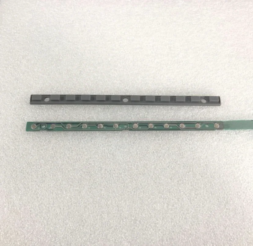 A new set of Series 21i-T console button strips