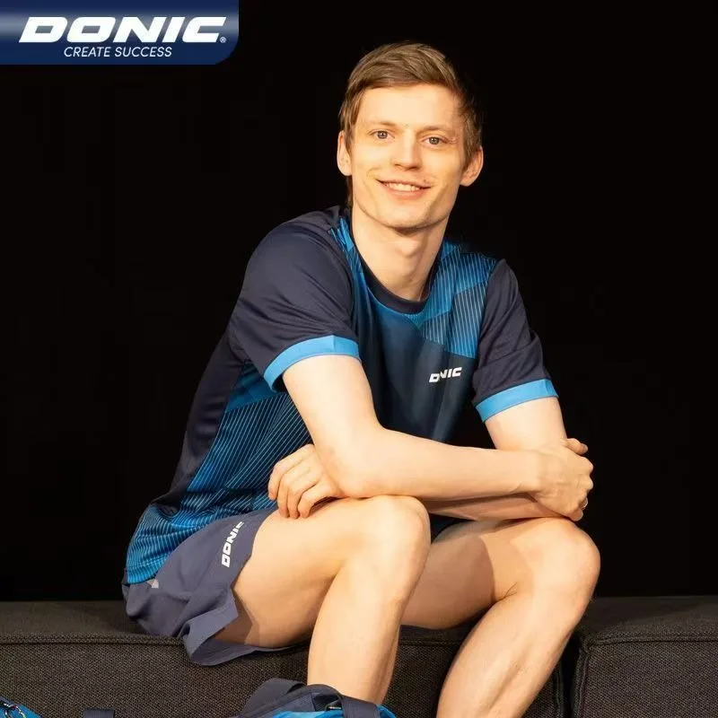 تي شيرت Donic لتنس الطاولة بأكمام قصيرة للرجال والنساء سريع الجفاف وجيد التهوية للمنافسة 83242