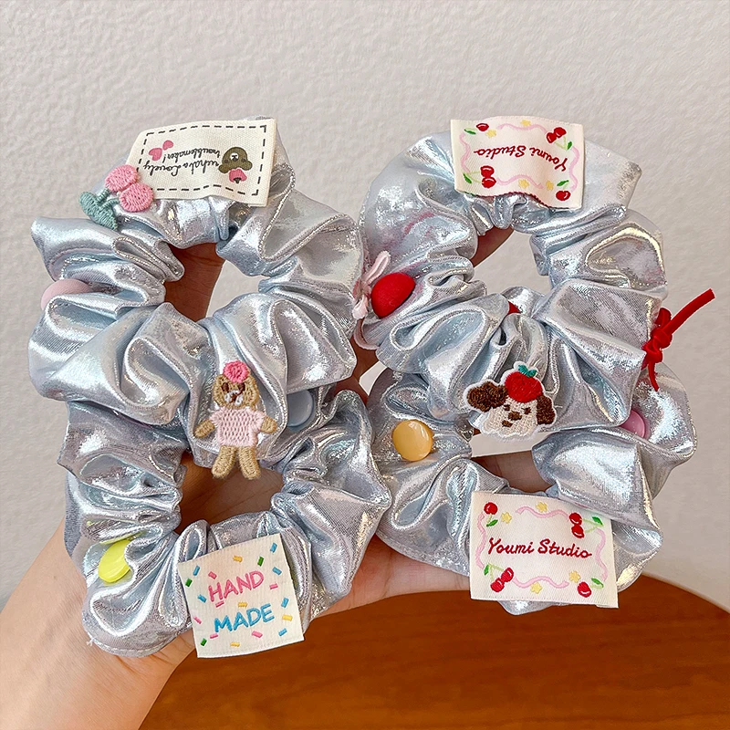 Neue Vintage-Haargummis in silberner Farbe, glänzend, aus metallischem Stoff, modische, hochelastische Haargummis für Frauen und Mädchen, Schleifen-Accessoires – Detail 1