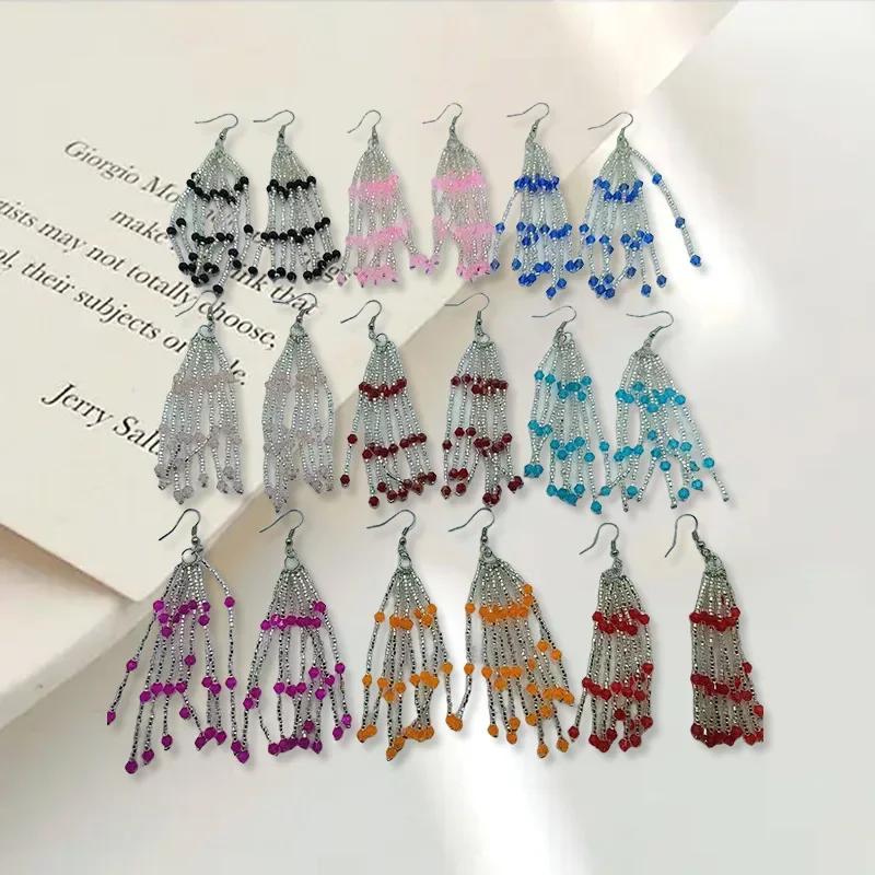 

Beaded earrings Hand weaving Crystal Retro Tidal current Simplicity Bohemia Tassel Alloy Rice bead earrings
