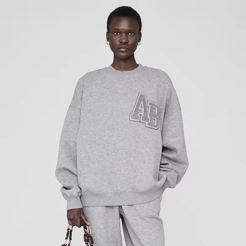 Invierno nuevo nicho norteamericano logotipo clásico manivela pegatina especial toalla bordada suéter de lana bordado para mujer