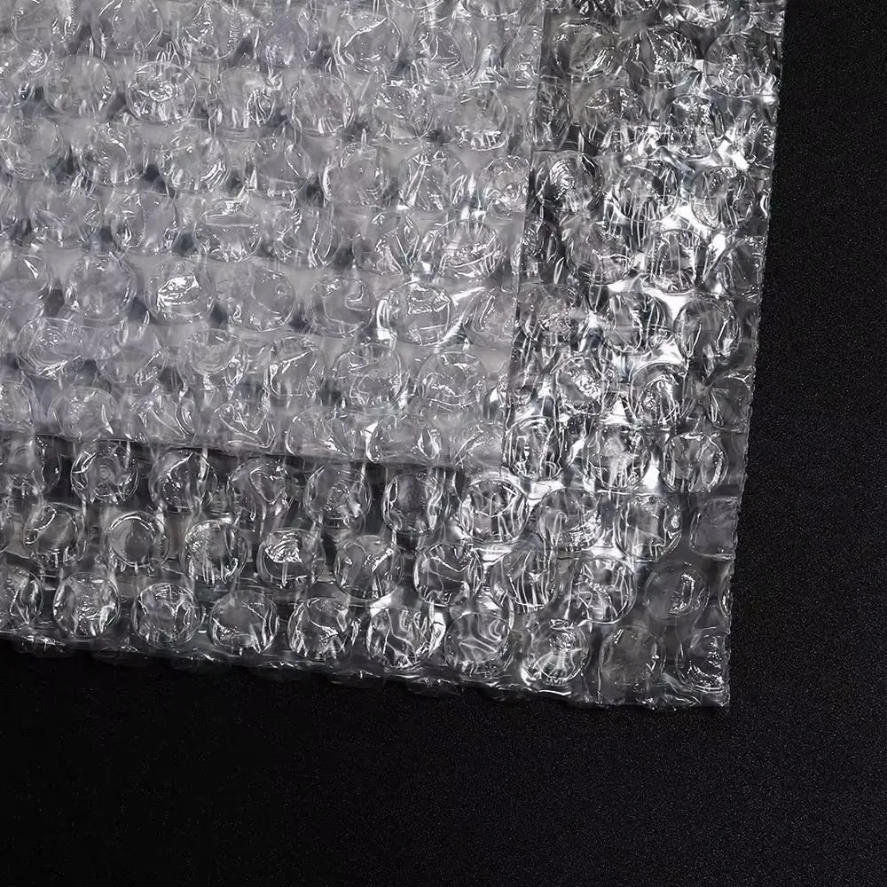 Stoßfeste, vibrationsdämpfende, doppellagige Polsterung mit Luftpolsterfolie und Schaumstoffpolsterung für den Versand von zerbrechlichen Gegenständen, Verpackungsmaterial. – Detail 7