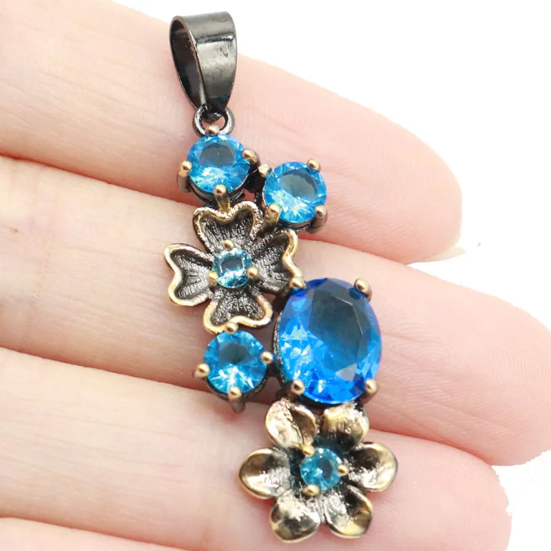 

Buy 4 Get 1 Free 42x15mm Green Emerald Rich Blue Violet Tanzanite Swiss Blue Topaz Black Gold Silver Pendant