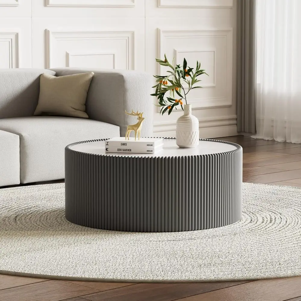 

Round Grey Coffee Table with Sintered Stone Top and Leather-Wrapped Base