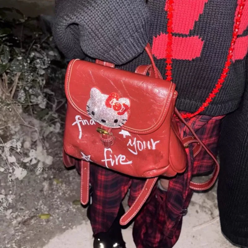 ﻿ Sanrio Helllo Kitty mujeres Y2k dulce picante chica mochilas ropa de calle dibujado a mano mochila versátil de moda nueva tendencia bolso de nicho