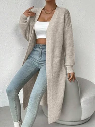 Fashionable and elegant solid color knitted sweater V-neck mid length hollowed out cardigan sweater women's top
