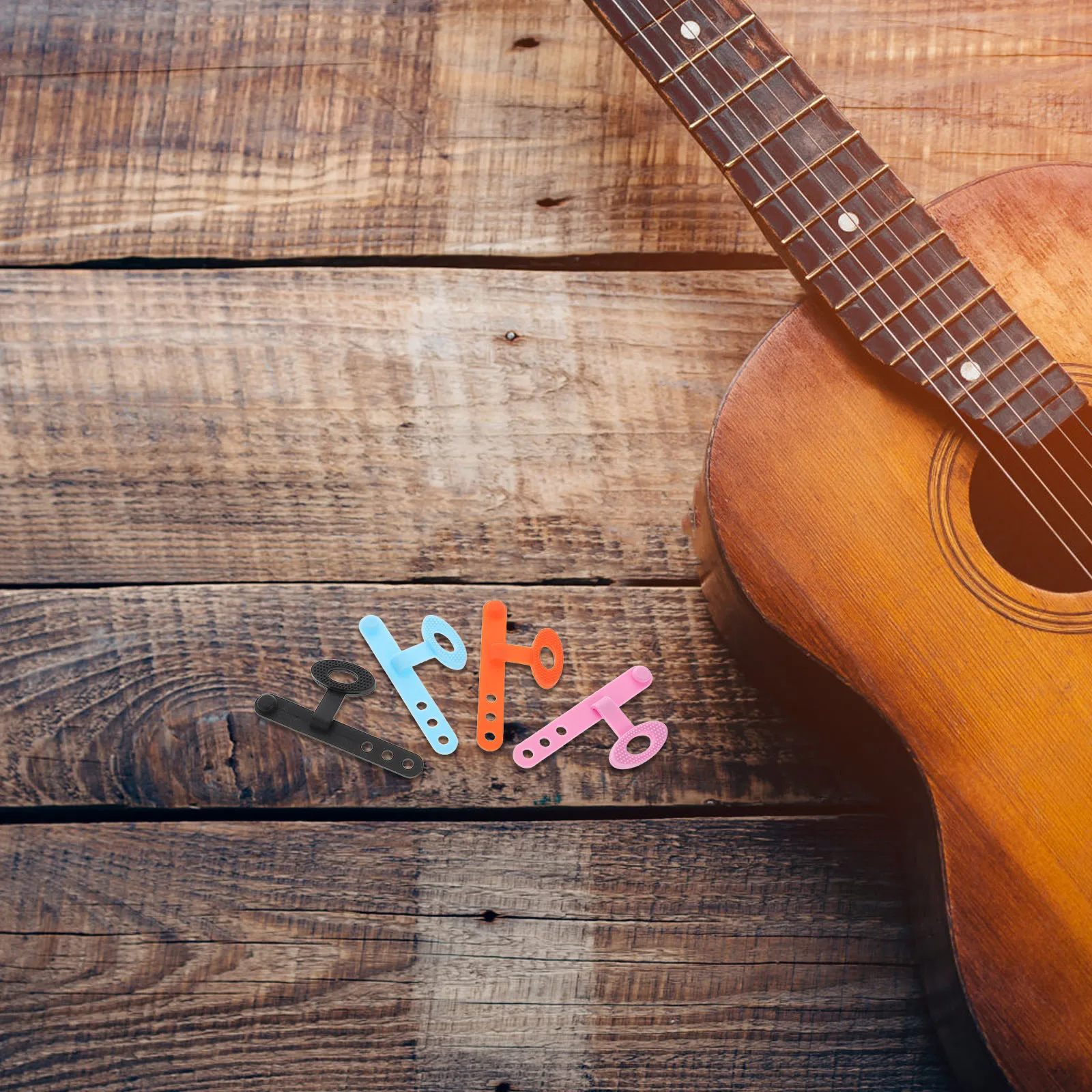 

4pcs Guitar Pick Set Silicone Finger Sleeve Acoustic Electric Guitar Accessories Anti-slip Grips Cover Black Orange Sky Blue