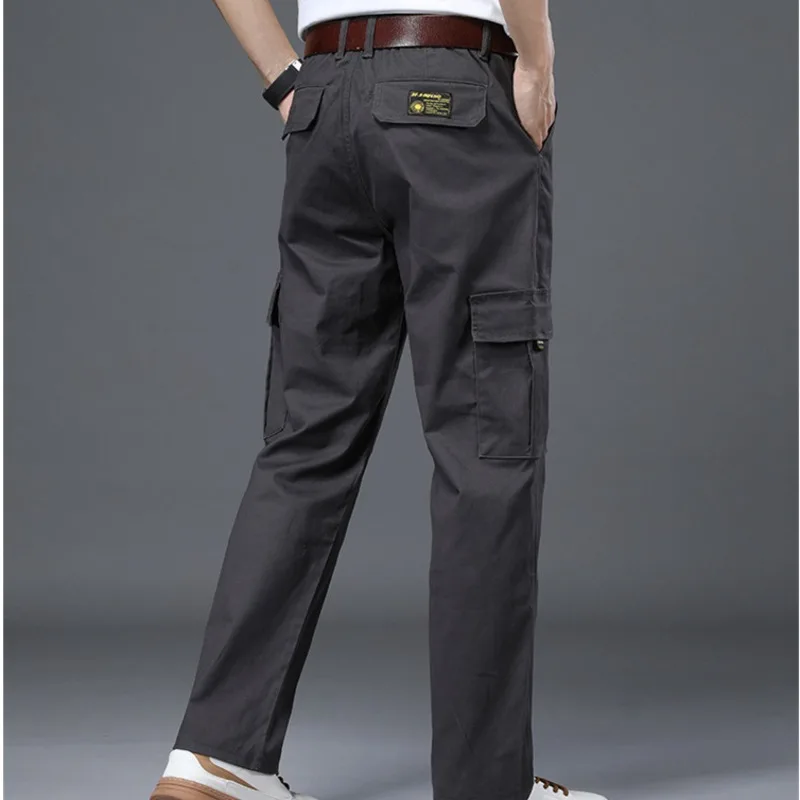 Four Seasons ใหม่ผ้าฝ้ายยืดกางเกงทํางานผู้ชายหลวมตรงเอวยางยืดสบายๆหลายกระเป๋ากางเกง