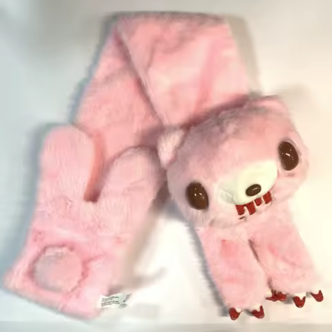 Pink Gloomy Bear plush scarf. Soft faux fur, iconic bear face. Warm & stylish for fans.