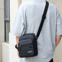 The men's single-shoulder bag, made of business-grade nylon fabric, can be worn either crossbody or carried by hand.