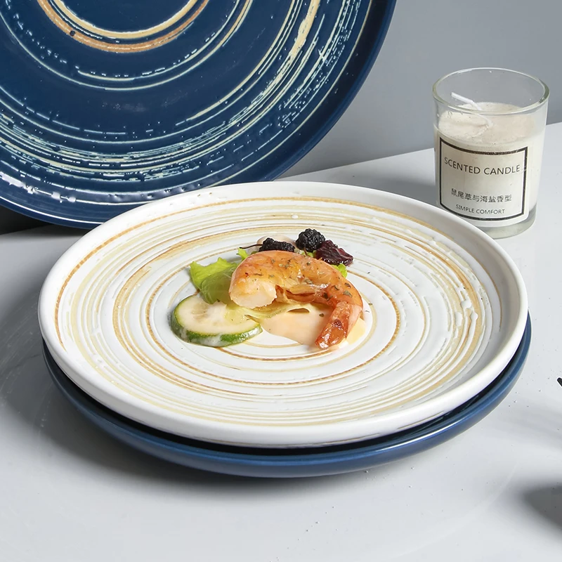 

Japanese hand-painted creative ceramic household snack fruit fish plate steak round flat plate shallow