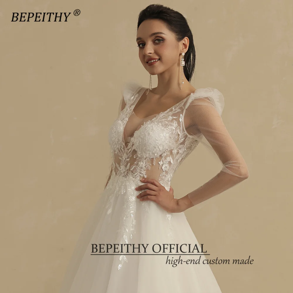 BEPEITHY V คอยาวแขน Boho ชุดแต่งงานสําหรับผู้หญิง 2023 เจ้าสาวสายเปิดกลับเซ็กซี่แปลกชุดเจ้าสาวชายหาด ...