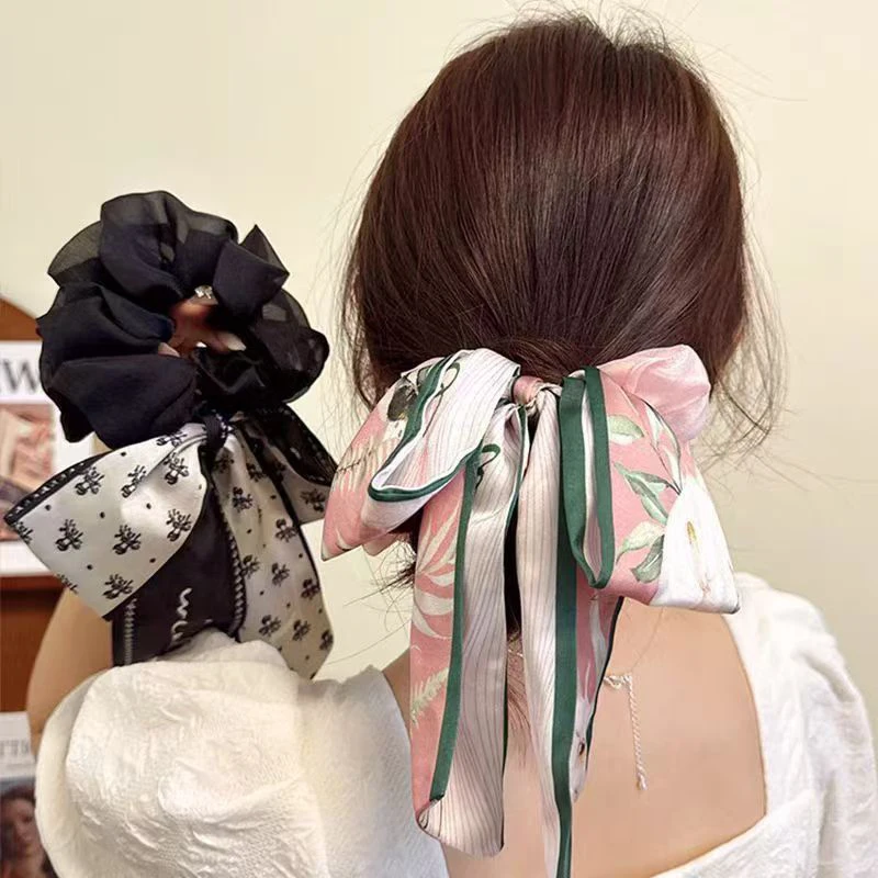 Elegante corda per capelli con fiocco stampato: fascia per coda di cavallo con nastro dolce, accessorio per capelli alla moda per le donne