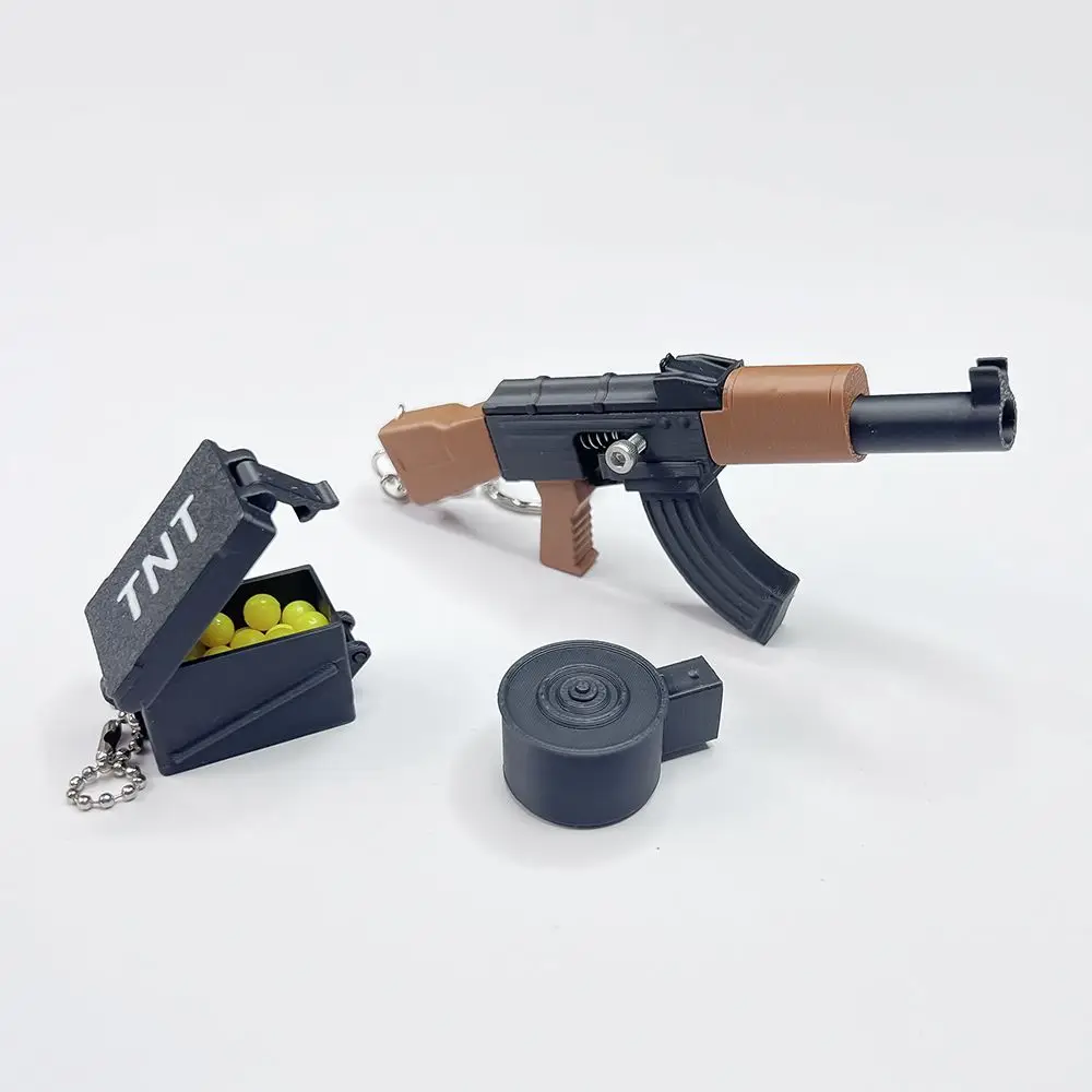 

Hot Selling 3D Printed Mini Finger Gun Keychain, CS Series AK Bolt Action Launchable Ball Toy Detachable Magazine Drum Gift