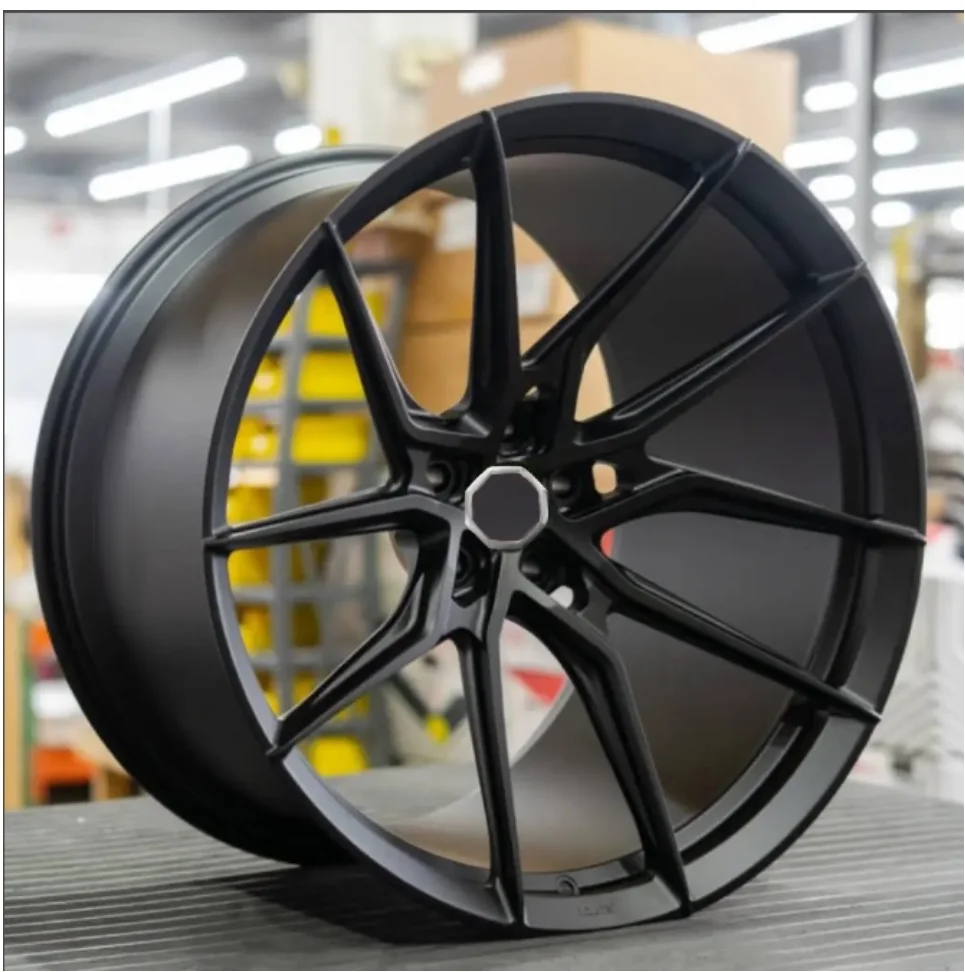 

Forged wheels Vossen NF8 design, brushed black color, MG cover.