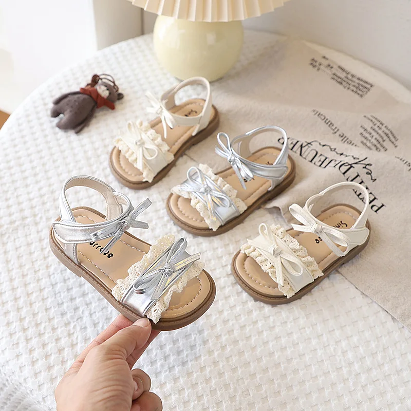 

Kids Sandals for Girls 2026 Summer New Non-slip Soft Sole Toddler Beach Shoes with Cute Bowtie Elegant First Walkers Barefoot