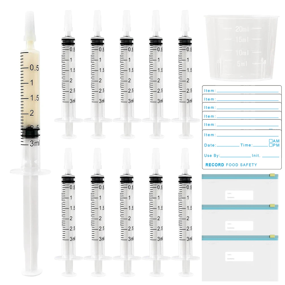 The Colostrum Collection Kit Includes a 3ml Colostrum Syringe with Cap, Stickers, a Transparent Zipper Bag, and a Measuring Cup