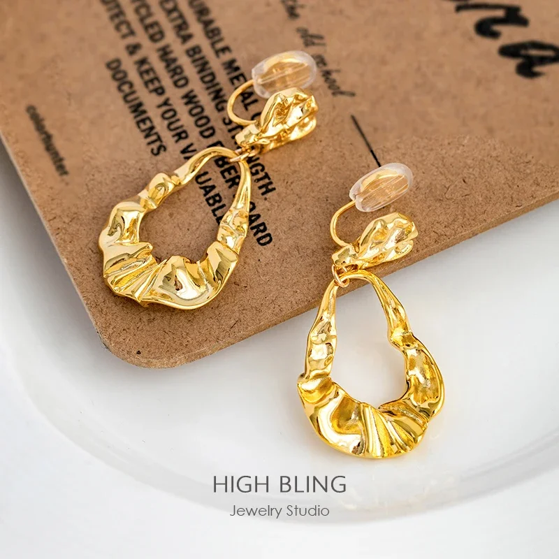 Original design sense irregular metal texture handmade hammer earrings without ear holes female mosquito coil disc ear clips