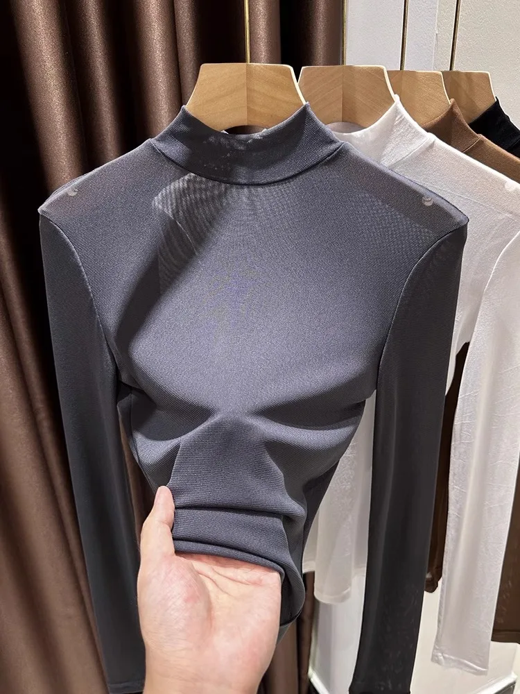 Przezroczysta, cienka, długa bluzka z wysokim kołnierzem, bazowa, damska, wiosenno-jesienna, koronkowa, elegancka, do pracy.