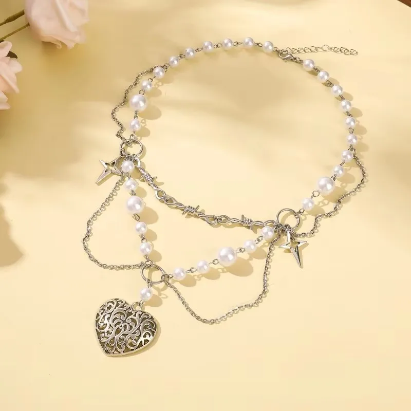 High-end sense of multi-layer imitation pearl four-pointed star tassel love pendant necklace fashion temperament ladies accessor