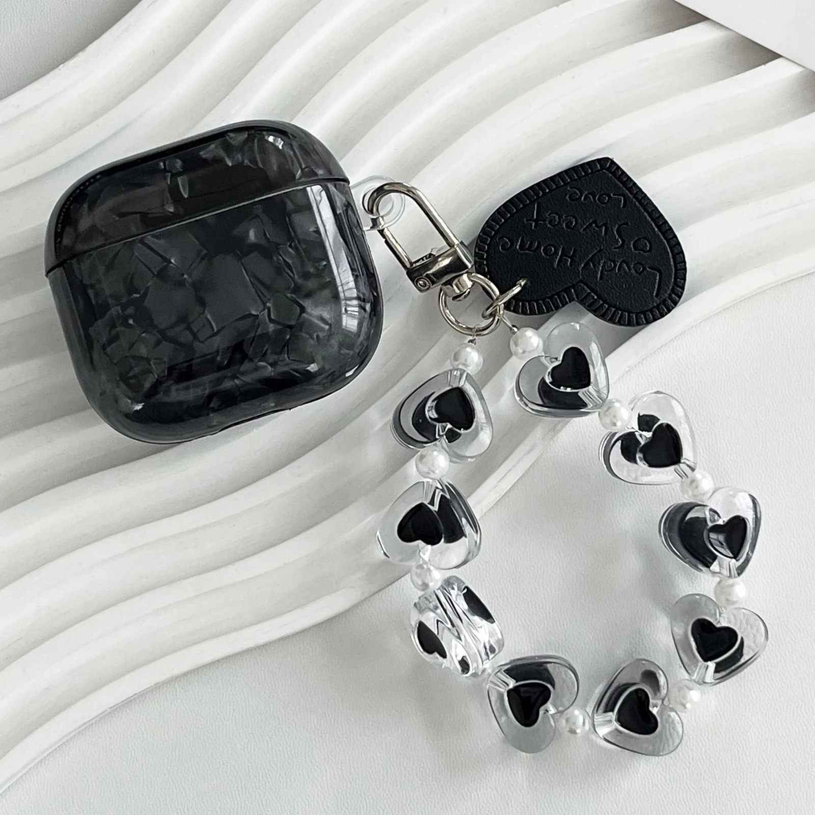 For AirPods 4 Protective Case Black Shell Texture TPU Earphone Cover with Heart Beaded Wrist Strap Chain