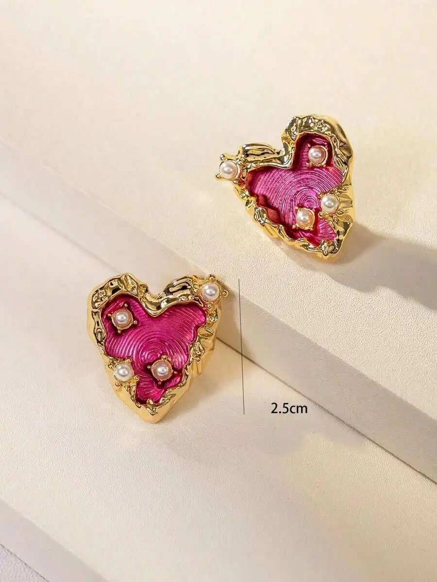 

Exaggerated Heart Stud Earrings In Vintage Boho Style With Pink Enamel And Pearl Embellishments