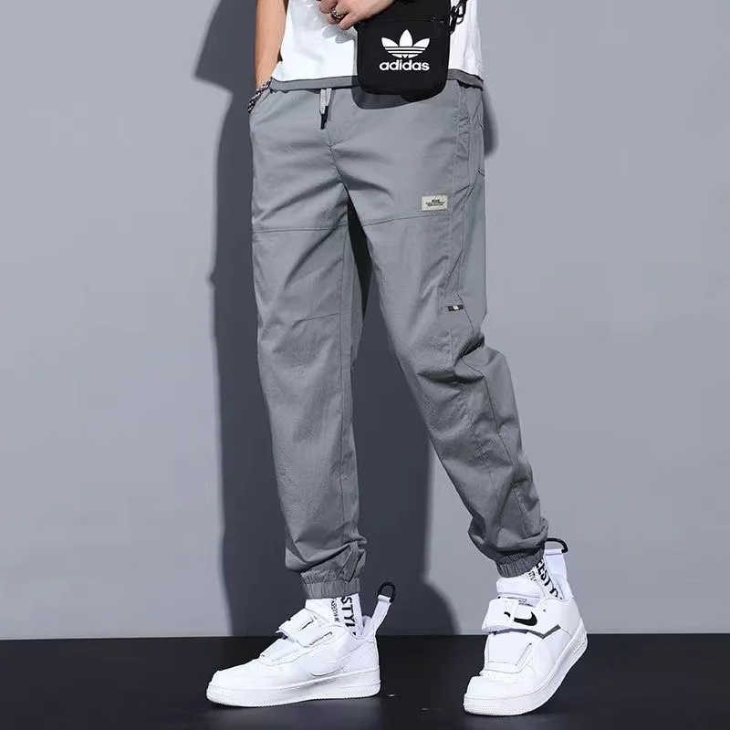 

Summer Young Style Streetwear Solid Color Breathable Men Pockets Bound Feet Slim High Street Popular All-match Casual Trousers