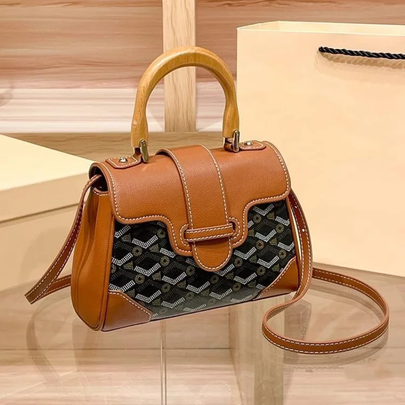 

Сумка Saigon Flap Bag 2026, винтажная сумка с монограммой и замком, из натуральной кожи, с верхней ручкой, через плечо, нишевый шик