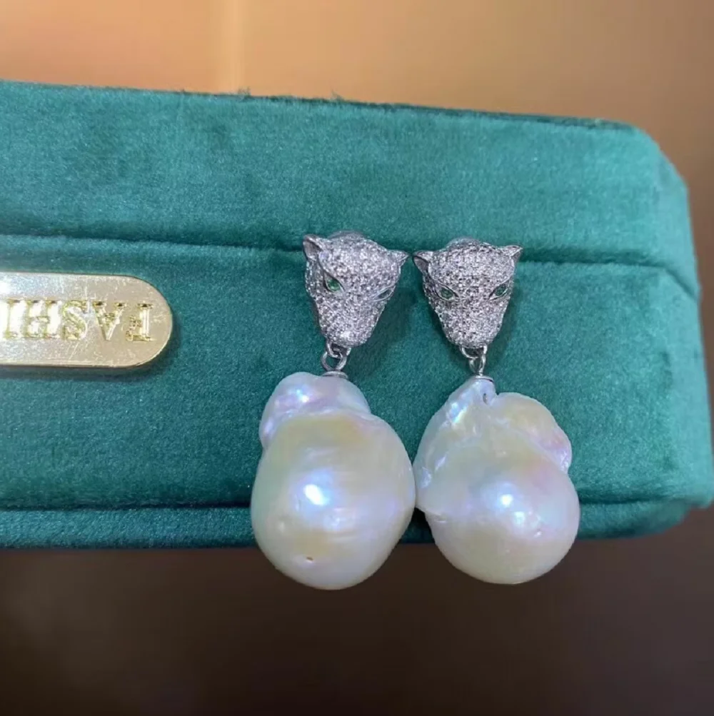 

Изысканные серьги AAA13-18 мм с натуральным жемчугом Южных морей в стиле барокко, серебро 925 пробы.