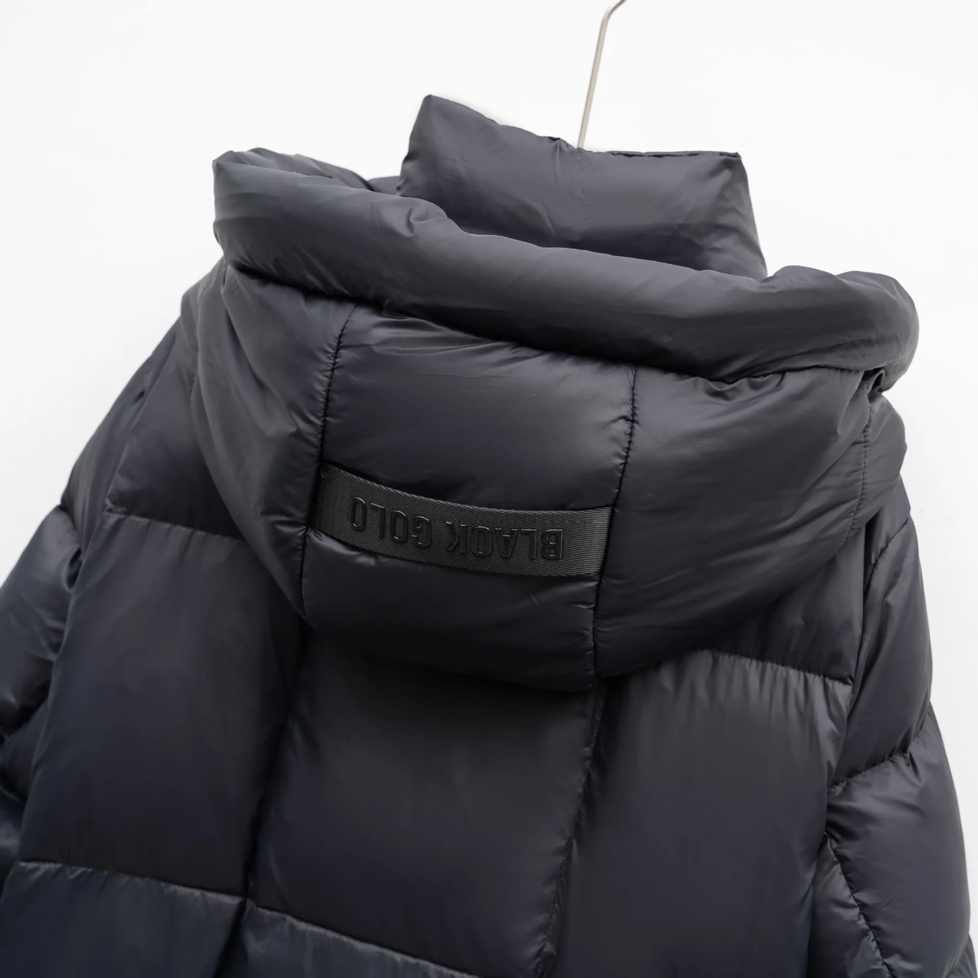 Winter New Women's Down Jacket Loose Commuter Hooded Warm and Cold Proof Down Jacket