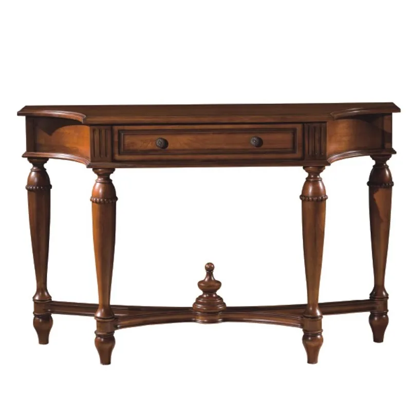 

Американский входной столик, диван из массива дерева, спинка нескольких столов у стены, простой стол