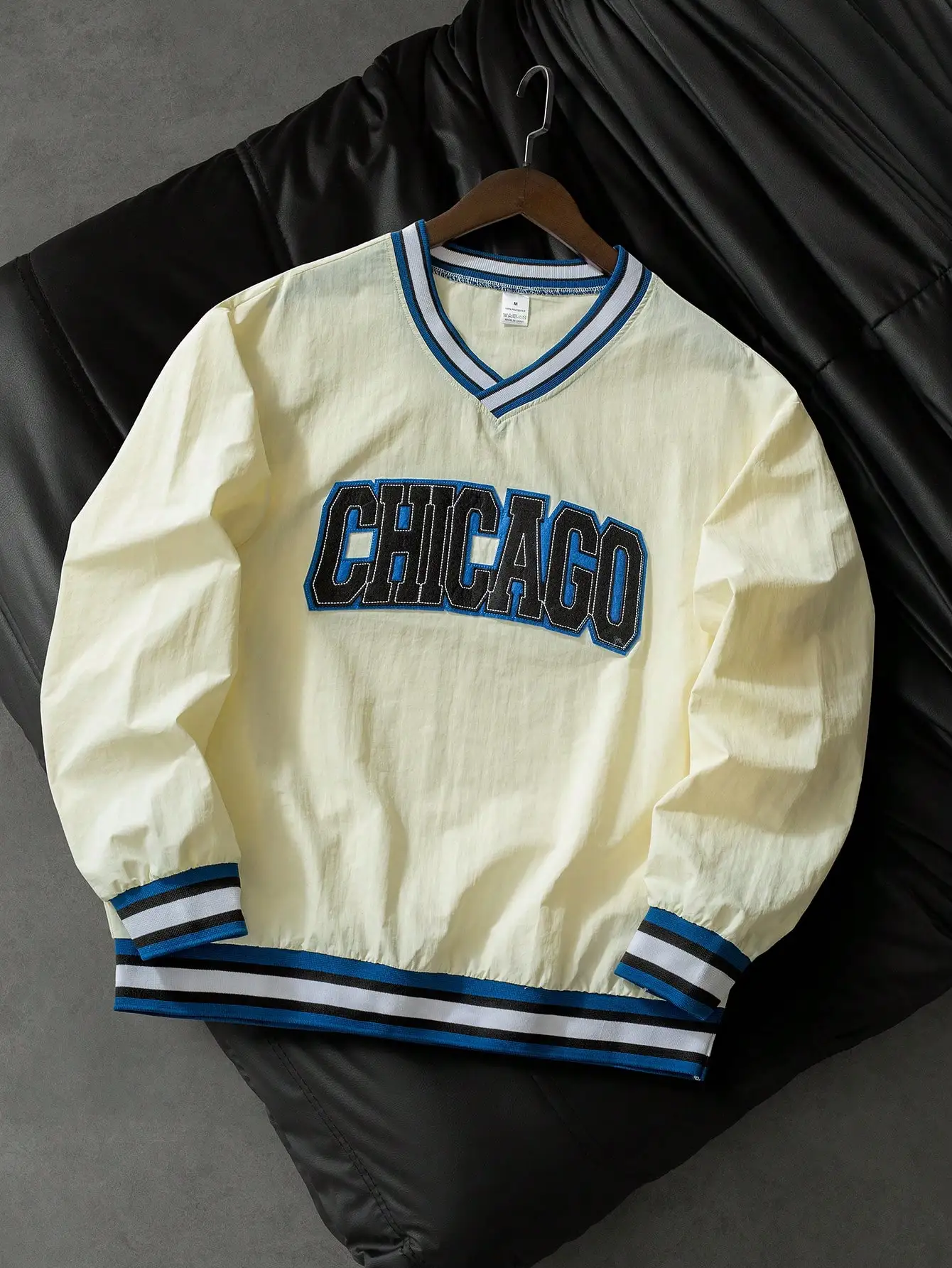 Stylish Men's V-Neck Embroidered Pullover Sweatshirt—Featuring a Collegiate Athletic Style, Perfect for a Comfortable Commute.