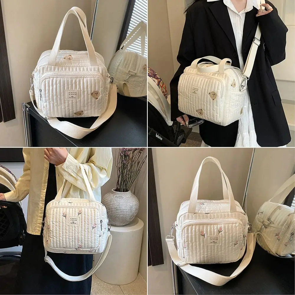 

Сумка для мамы с цветочной вышивкой медведя, регулируемый ремень, хлопчатобумажная ткань, сумка для подгузников для детской коляски, многофункциональная большая вмести...