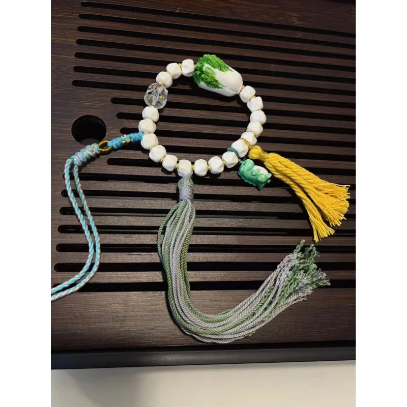 Unshaped bone bracelet paired with a deer antler and a hundred-sided white wealth.