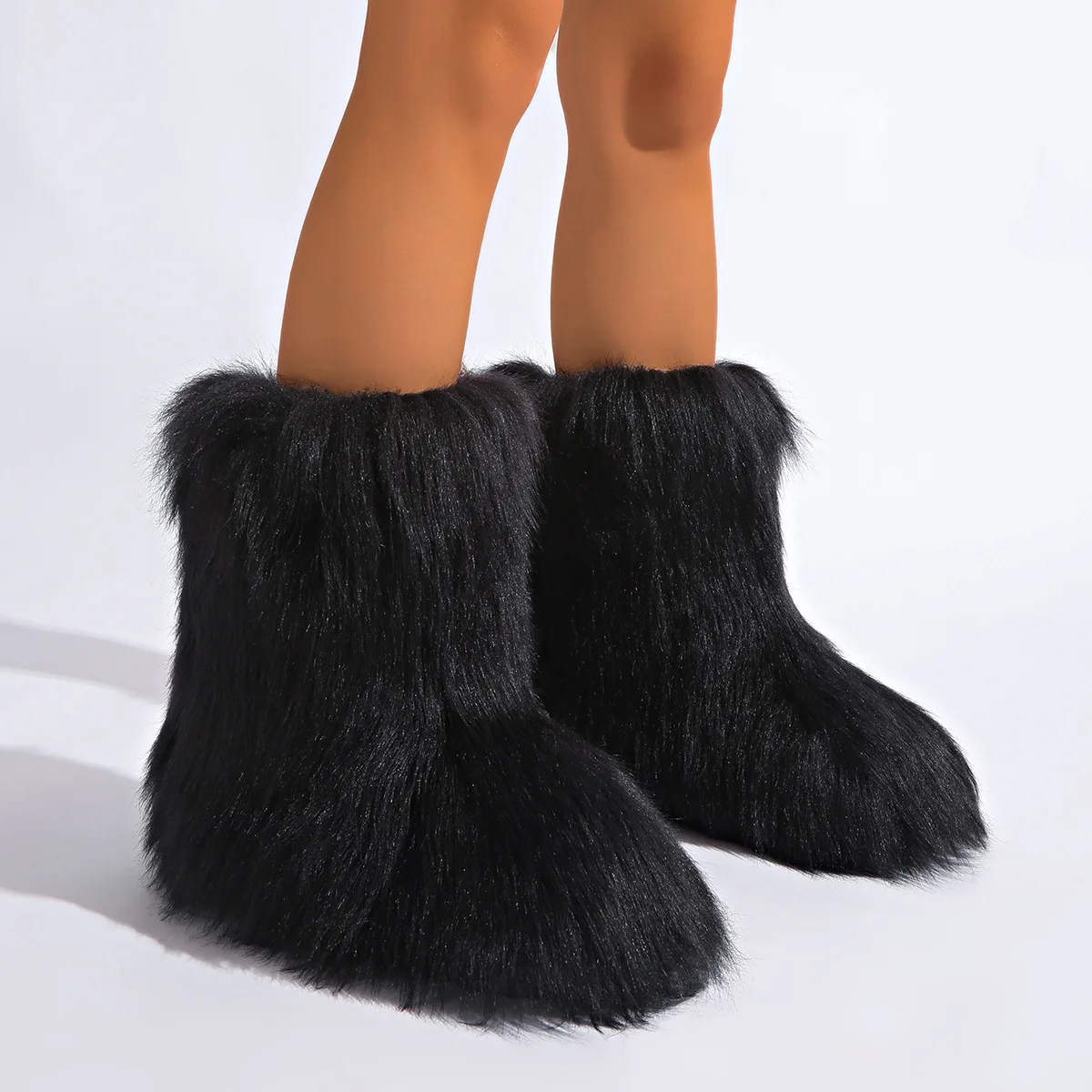 IPPEUM الكاحل المنغولية فراء الأحذية الشتاء الأسود للنساء 2025 جديد كعب مسطح حجم كبير 46 أفخم فروي الأحذية