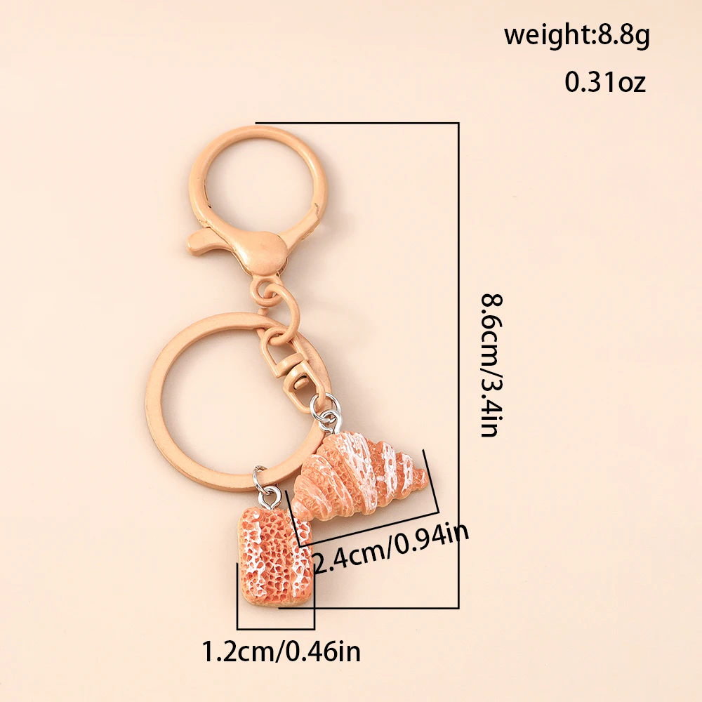 Niedlicher Schlüsselanhänger in Form eines Brotbrotes, Croissant- oder Butterbrot-Designs, für Damen und Herren, als Anhänger für Handtaschen, zum Selbergestalten von Schmuck und zur Dekoration. – Detail 4