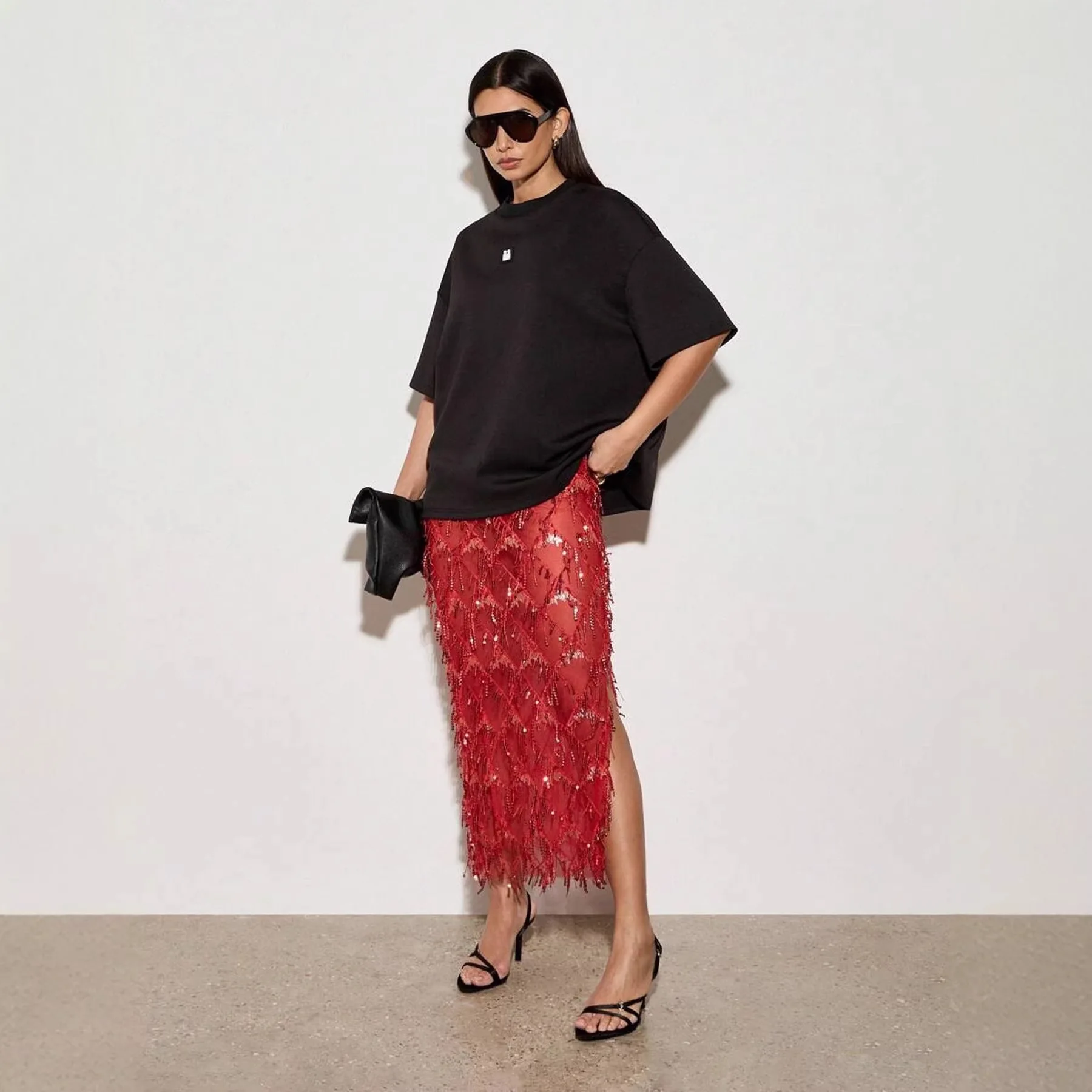 Fashion Shiny Sequins Half Skirt Sexy Hollow Out Tassel Solid Side Split Skirt Women Temperament Hight Waist Club Party Skirts