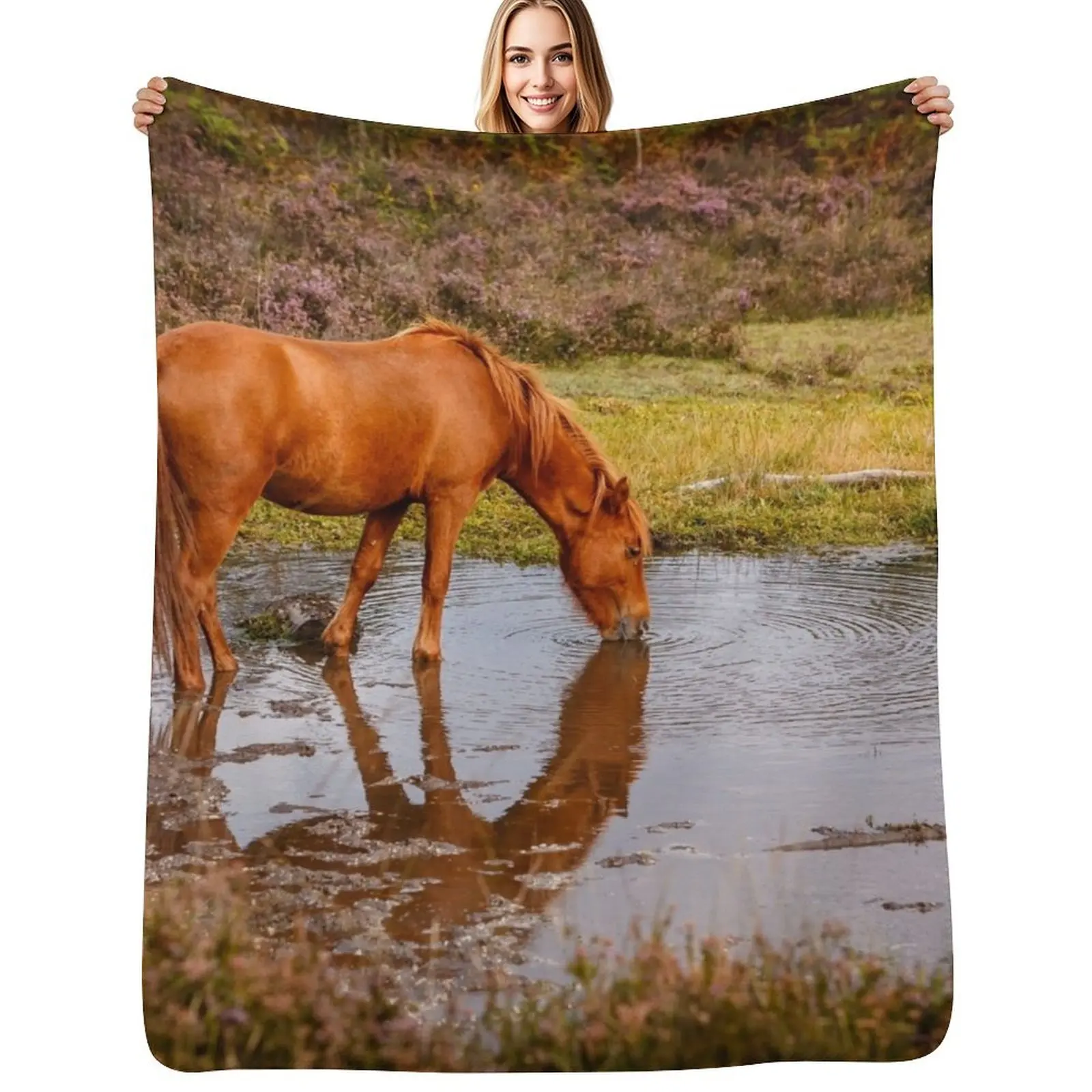 

New Forest pony at waterhole with reflection Throw Blanket blankets ands Decoratives Cute Moving Blankets