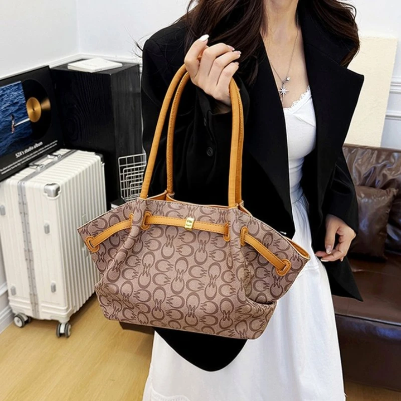 

The New Style of Bags Features Retro Monogram Tote Bags and Large-capacity European and American Hand-held Shoulder Bags