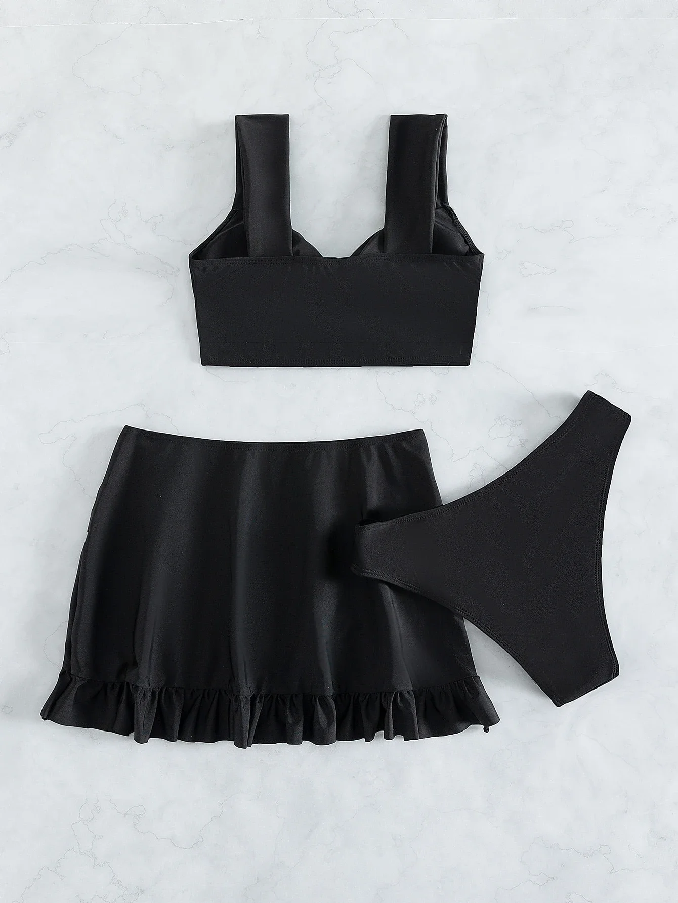 

Solid Black 3-Piece Swimwear Set With Twisted Crop Top, Ruffled Skort, And High-Cut Bottom