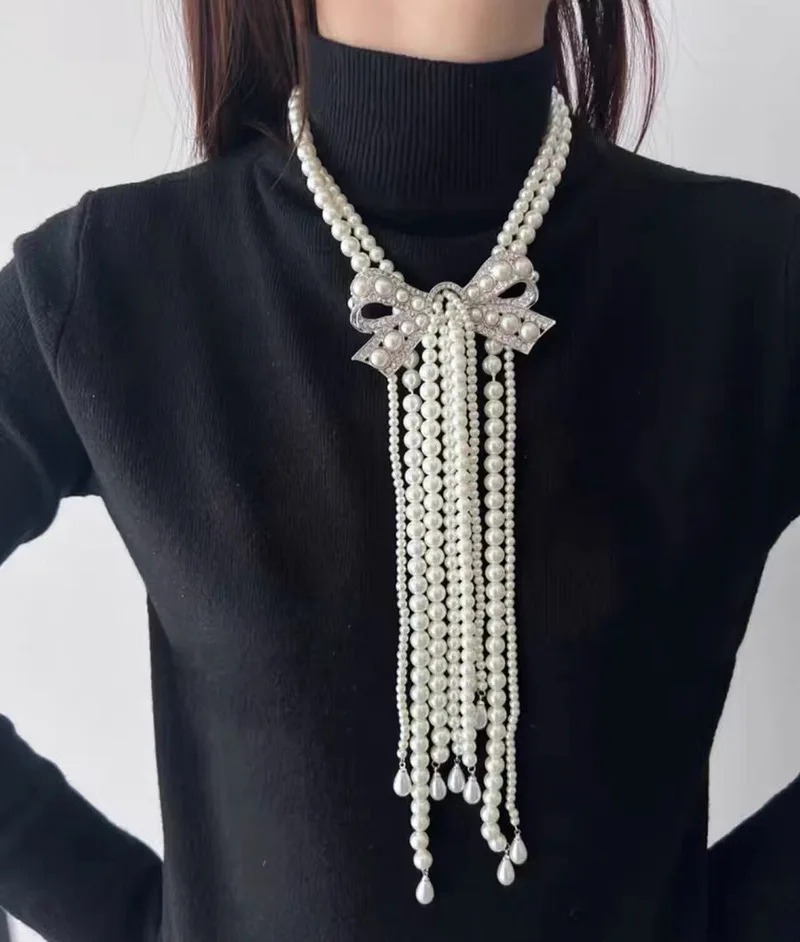 

European and American light luxury temperament celebrity style high sense bow pearl fringed necklace women