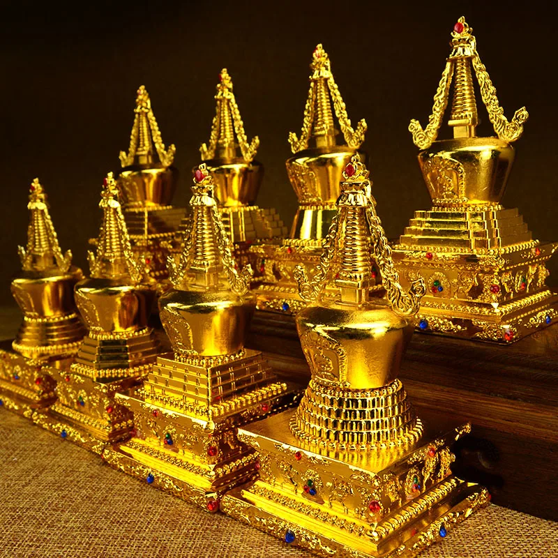 A set of 8 copper alloy Tibetan including the Eight Pagodas of Tathagata Bodhi Pagoda Buddha Pagoda and Saritaka