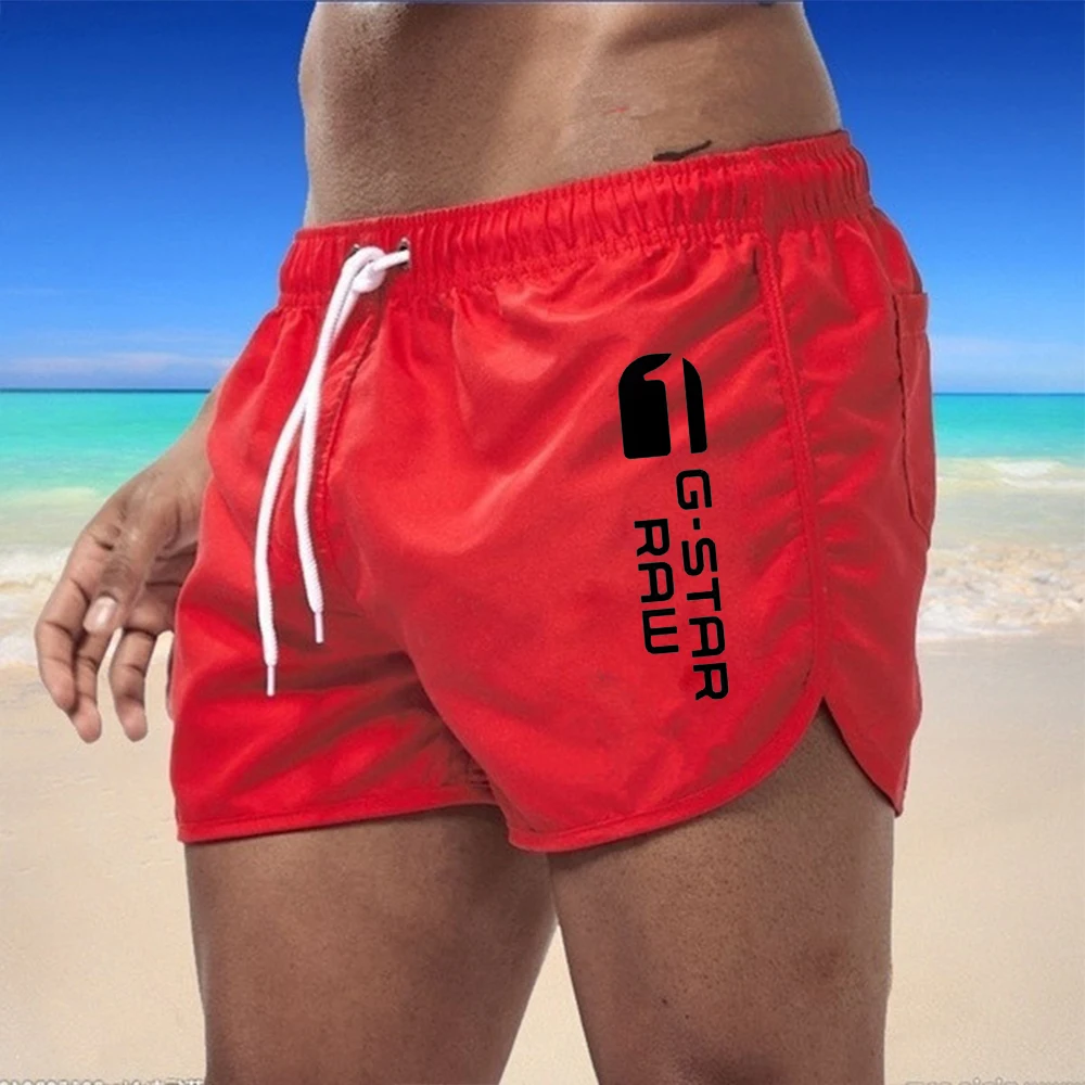 Nuovi pantaloni da bagno da spiaggia ad asciugatura rapida e traspiranti da uomo con pantaloncini sportivi e fitness stampati multicolori per