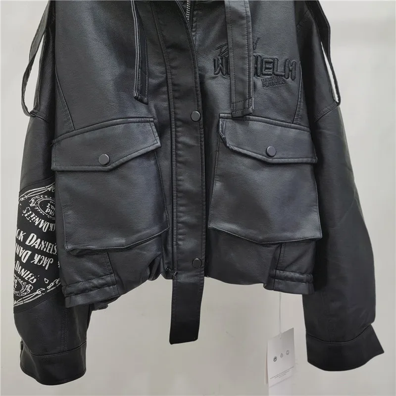 

Vintage Euro-style biker jacket. All-over print & high-waist cut. Flattering PU leather, chic statement piece.